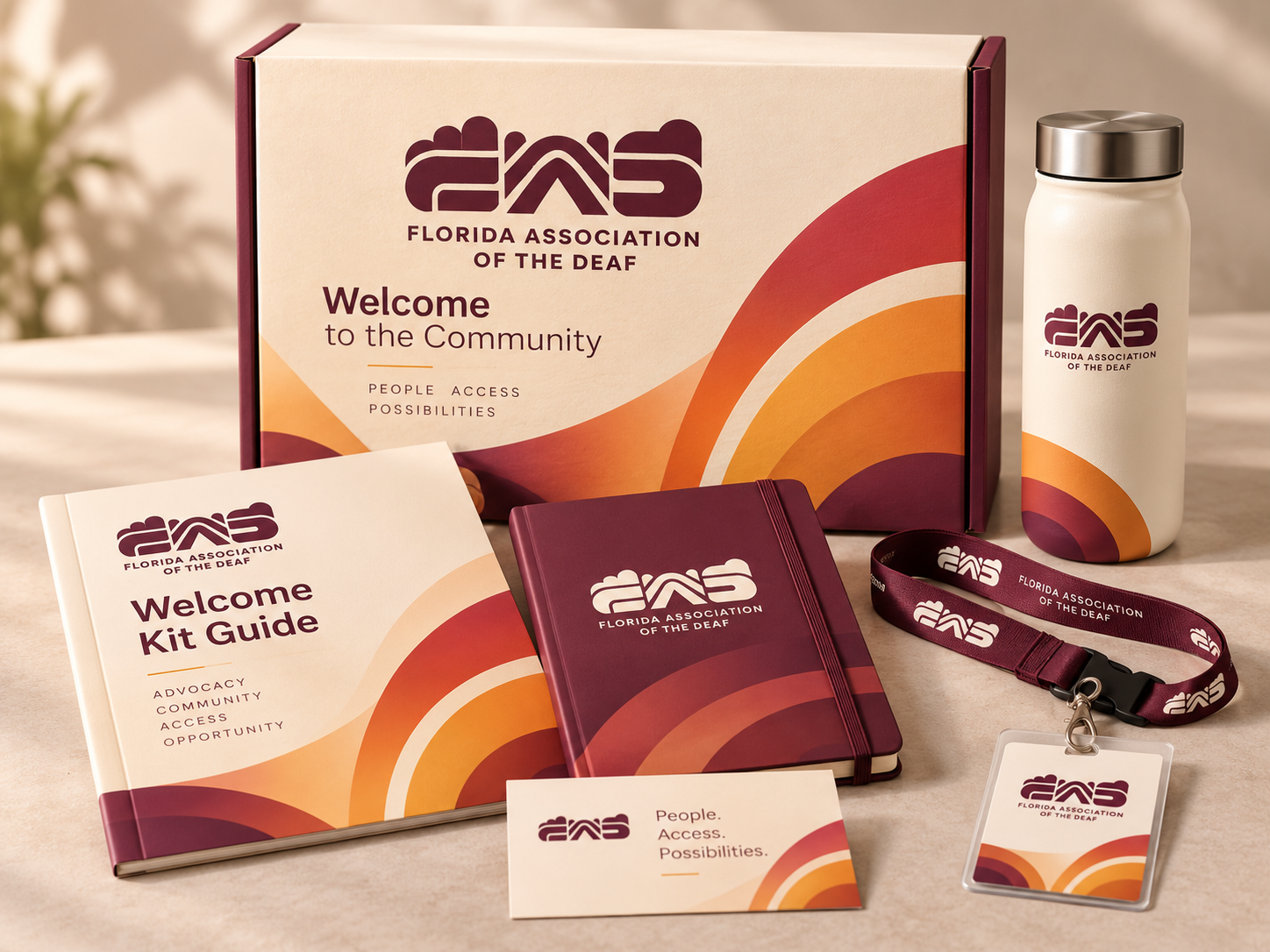 A membership welcome kit in the Sunrise direction: folder, letter, cards, envelope and stickers.